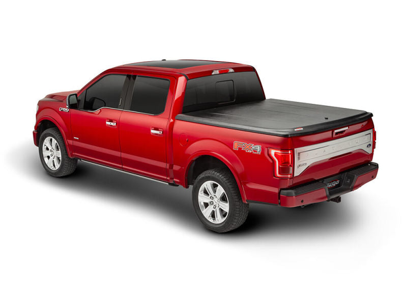 UnderCover 05-15 Toyota Tacoma 5ft SE Bed Cover - Black Textured (Req Factory Deck Rails)