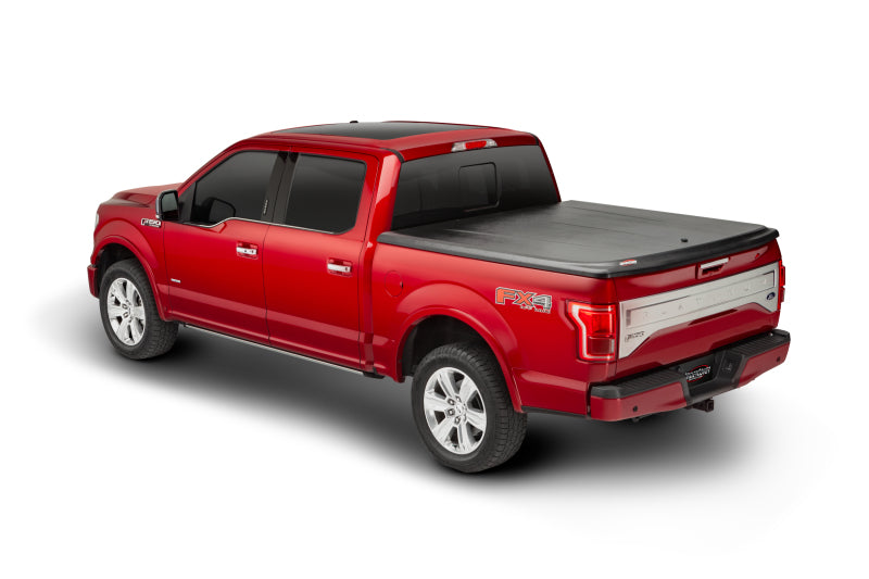 UnderCover 05-15 Toyota Tacoma 6ft SE Bed Cover - Black Textured (Req Factory Deck Rails)