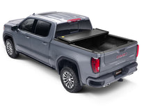 Load image into Gallery viewer, UnderCover 05-21 Nissan Frontier 5ft w/ Factory Cargo Management System Triad Bed Cover