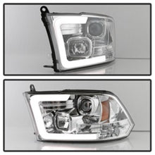 Load image into Gallery viewer, Spyder 09-16 Dodge Ram 1500 V2 Projector Headlights - Halogen - DRL - Chrome (PRO-YD-DR09V2-LBDRL-C)