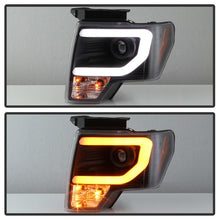 Load image into Gallery viewer, Spyder 09-14 Ford F-150 Projector Headlights - Halogen Model Light Bar - Blk PRO-YD-FF15009-SBLB-BK